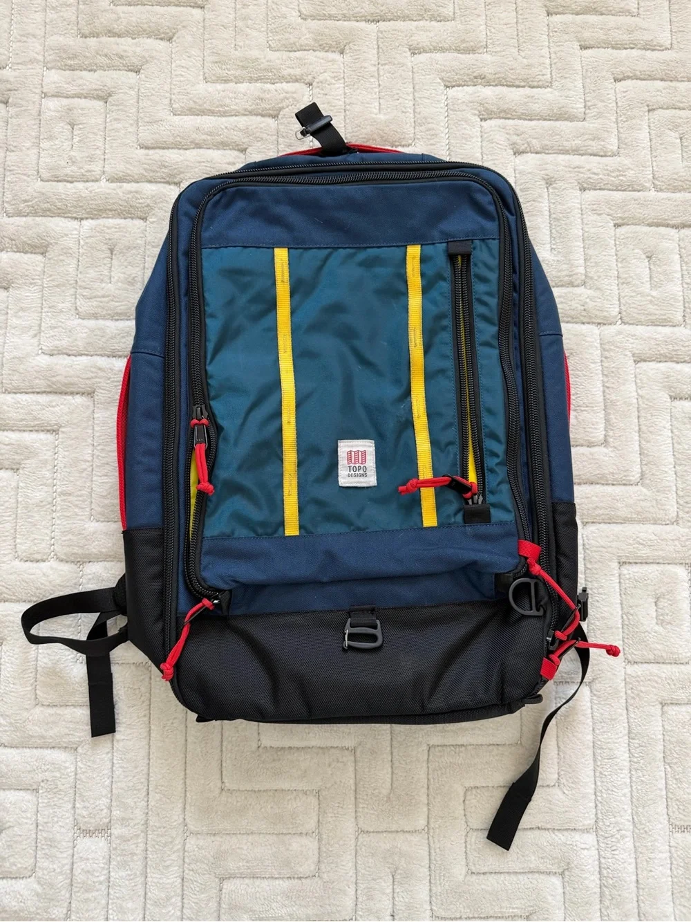 Topo Designs Navy, Teal & Yellow Men’s Backpack with Red Accents